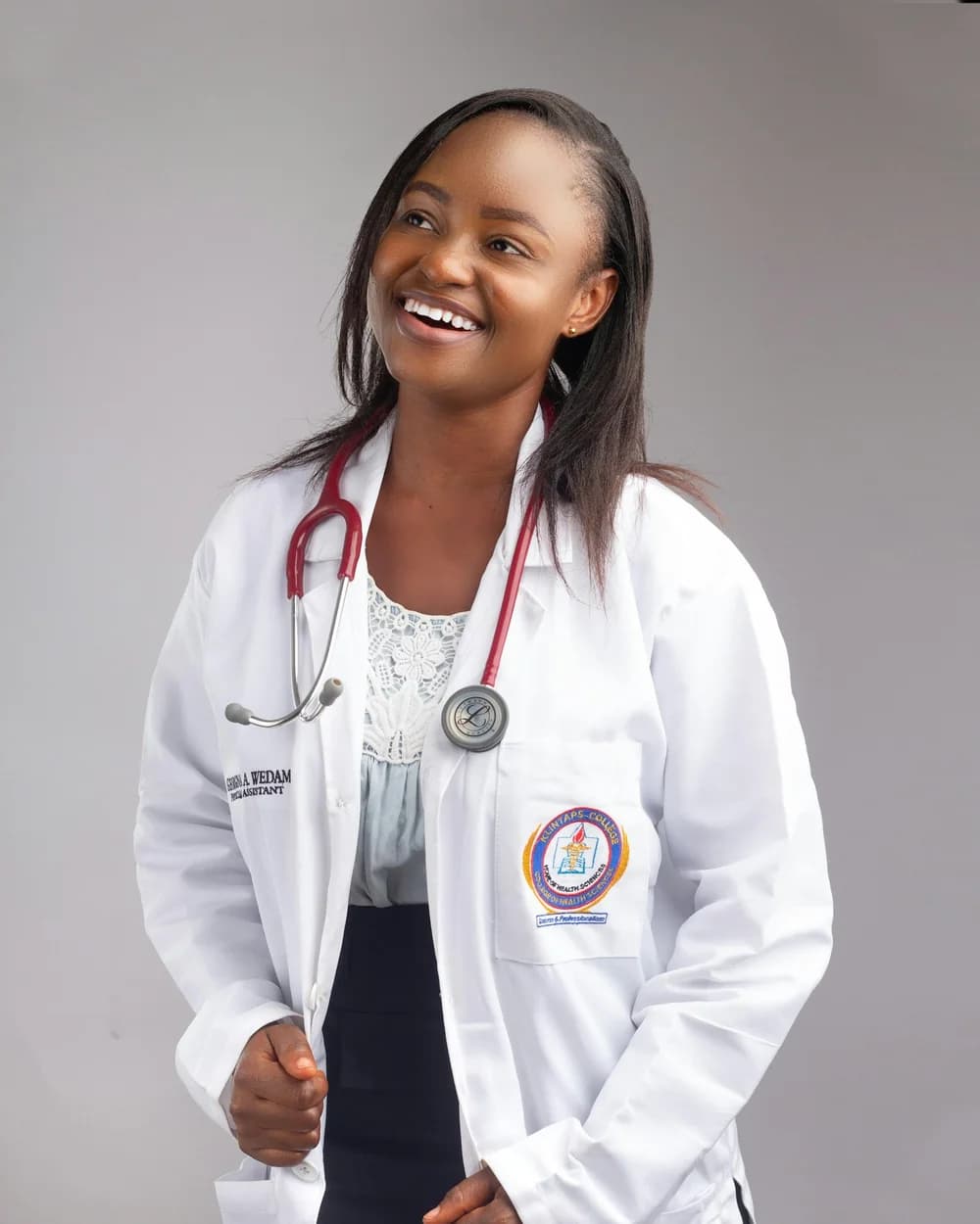 Smiling doctor in a white coat with a stethoscope